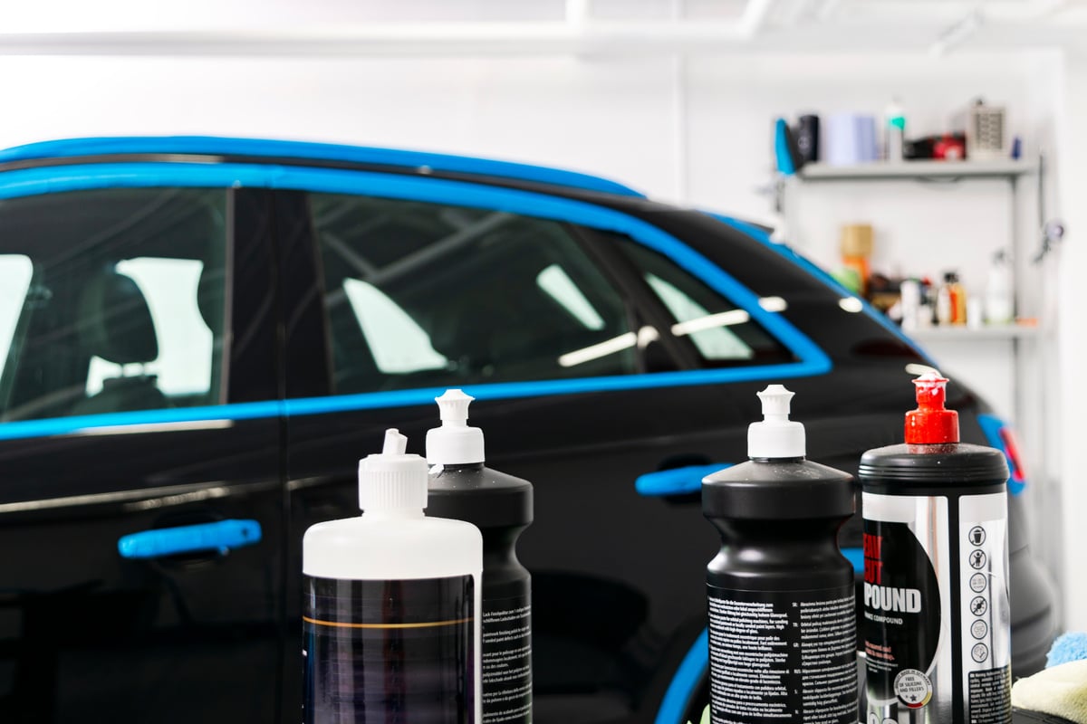 Car polish wax concept. Buffing and polishing car. Car detailing. Polish paste and tube. Polishing car service. Polish tools.